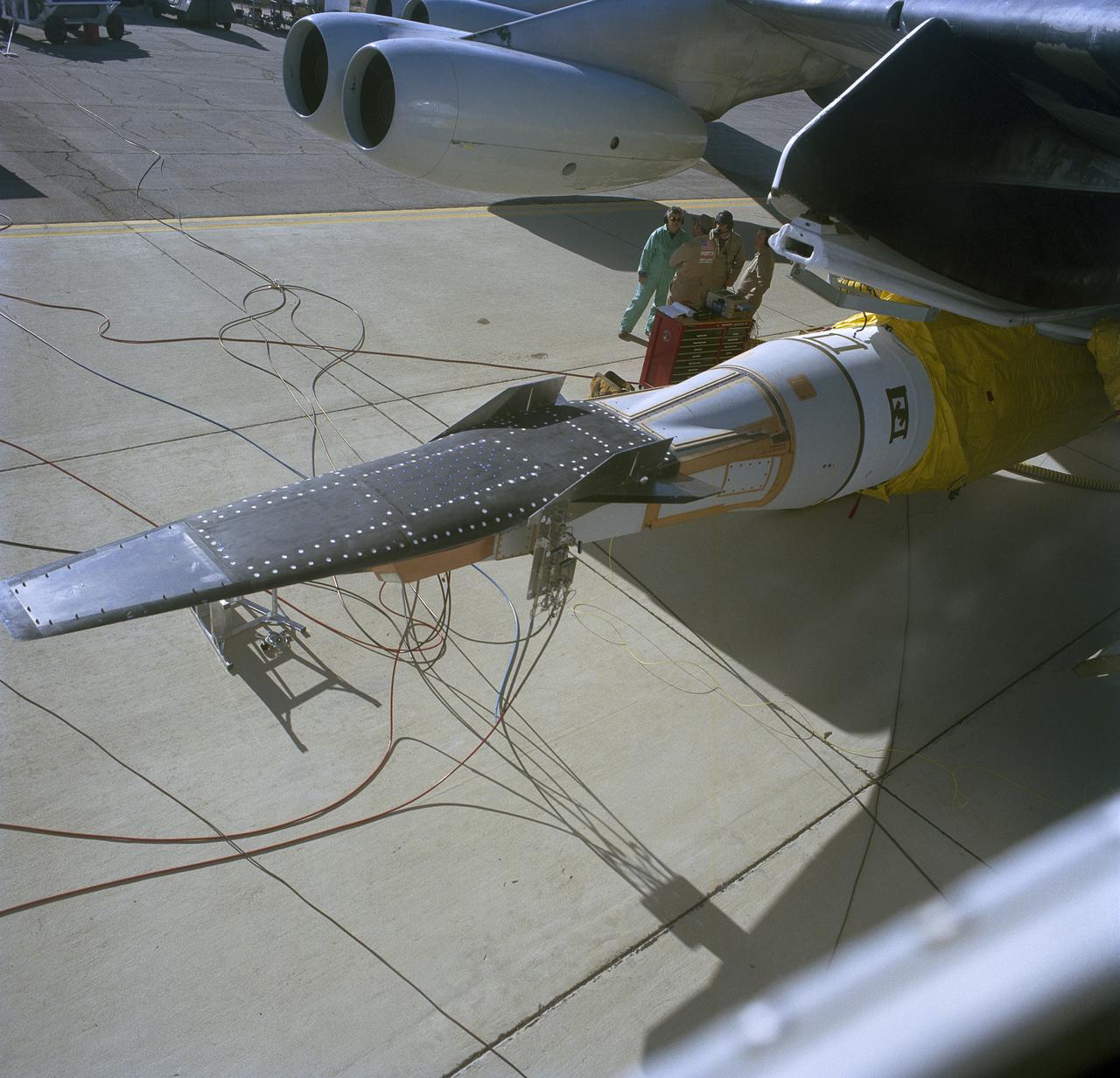 The X-43A is attached to the front of a Pegasus booster rocket, which is set to be carried beneath NASA’s B-52B wing. A dry run, known as a captive carry mission, was conducted to monitor the research hardware in flight for any challenges. The January 2004 X-43A flight was based at NASA’s Armstrong Flight Research Center in Edwards, California.