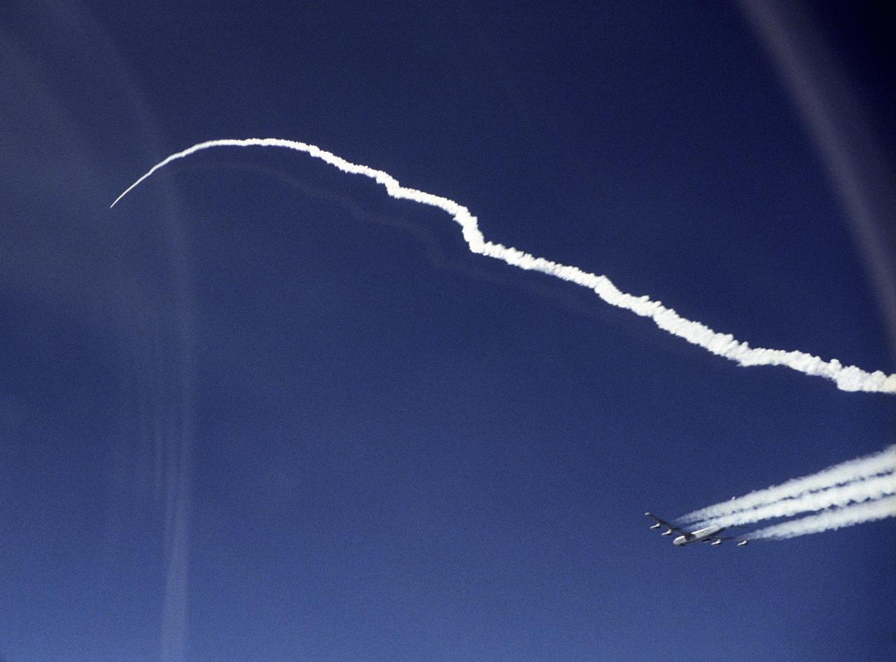 The second X-43A hypersonic research aircraft and its modified Pegasus booster rocket accelerate after launch from NASA's B-52B launch aircraft over the Pacific Ocean on March 27, 2004. The mission originated from the NASA Dryden Flight Research Center at Edwards Air Force Base, Calif. Minutes later the X-43A separated from the Pegasus booster and accelerated to its intended speed of Mach 7.