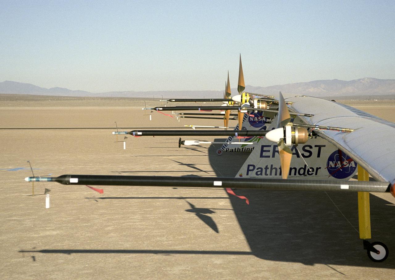 Sensitive instruments mounted on booms extending forward of the wing measure air turbulence and its effect on the stability of the Pathfinder-Plus solar-electric flying wing.