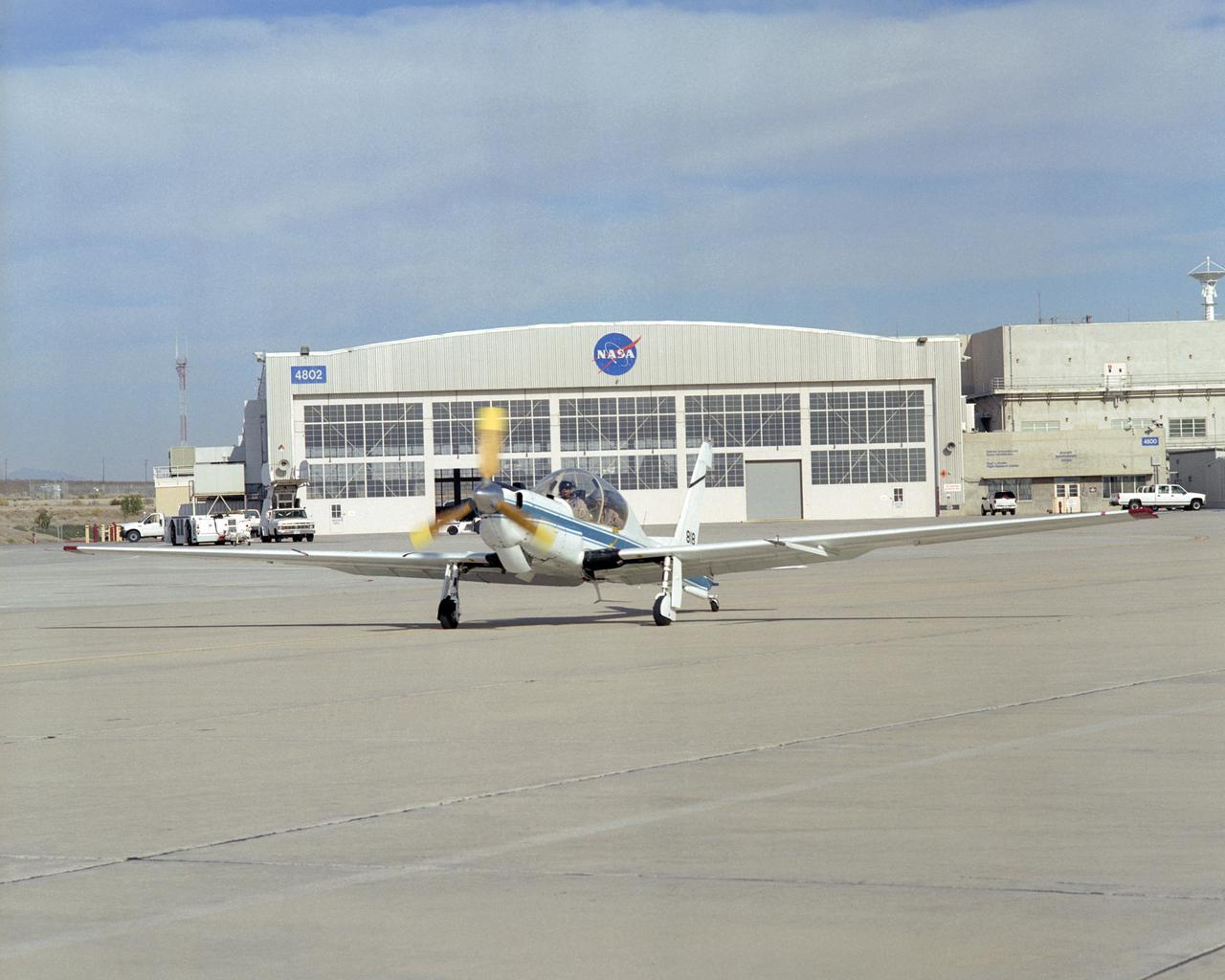 NASA's ultra-quiet YO-3A acoustics research aircraft taxis out from the ramp at the Dryden Flight Research Center before a pilot checkout flight.