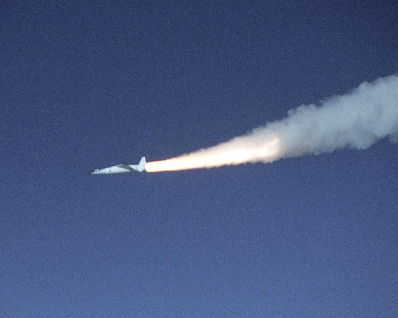 The third X-43A hypersonic research aircraft and its modified Pegasus booster rocket accelerate after launch from NASA's B-52B launch aircraft over the Pacific Ocean on November 16, 2004. The mission originated from the NASA Dryden Flight Research Center at Edwards Air Force Base, California. Minutes later the X-43A separated from the Pegasus booster and accelerated to its intended speed of Mach 10.