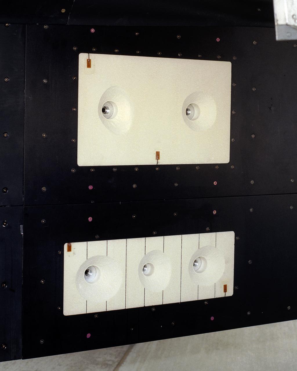 A close-up of the panels on the F-15B's flight test fixture shows five divots of TPS foam were successfully ejected during the LIFT experiment flight #2, the first flight with TPS foam.