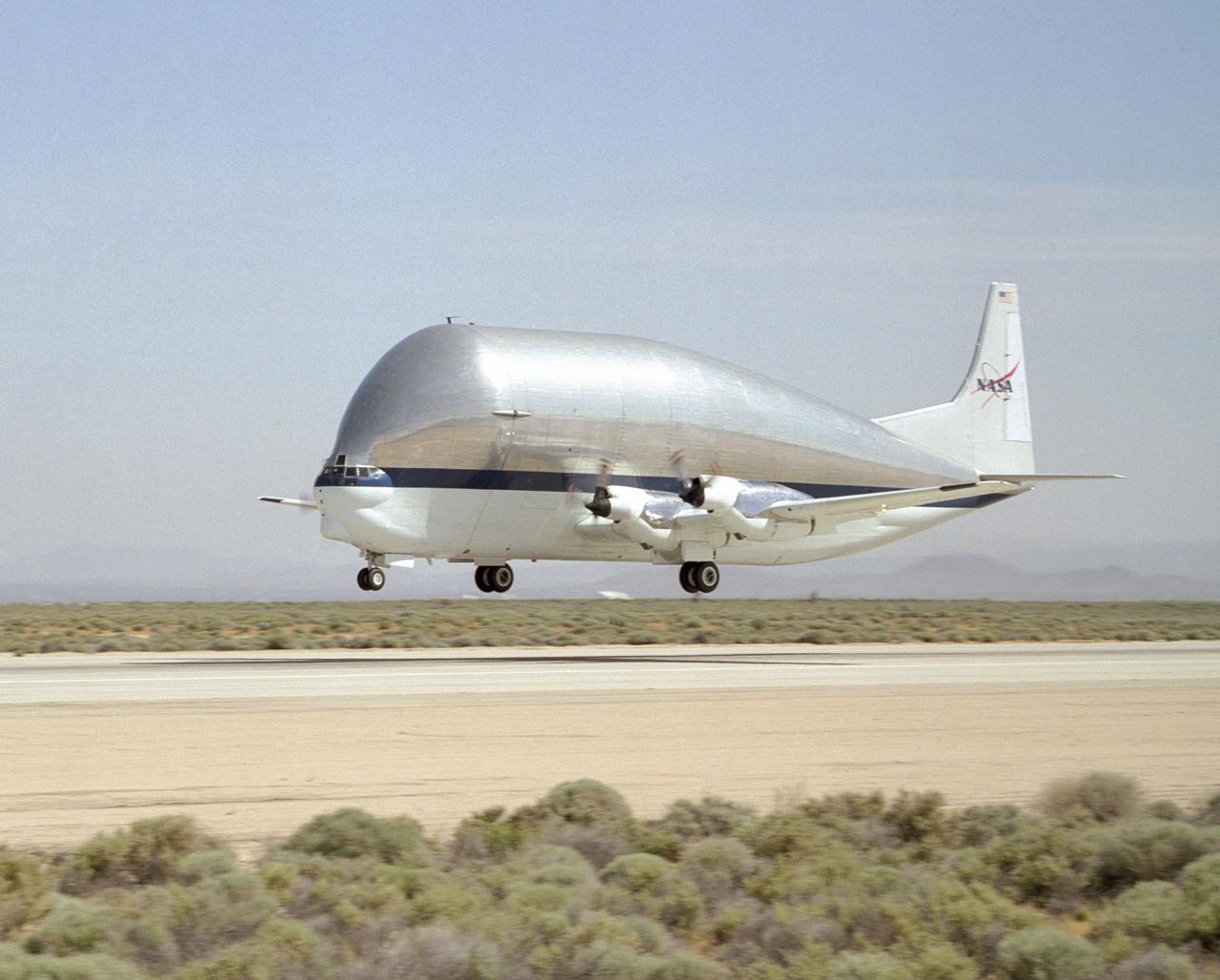 After replacement of its landing gear at NASA Dryden, NASA's Super Guppy Turbine cargo plane takes off from Edwards AFB to return to the Johnson Space Center.