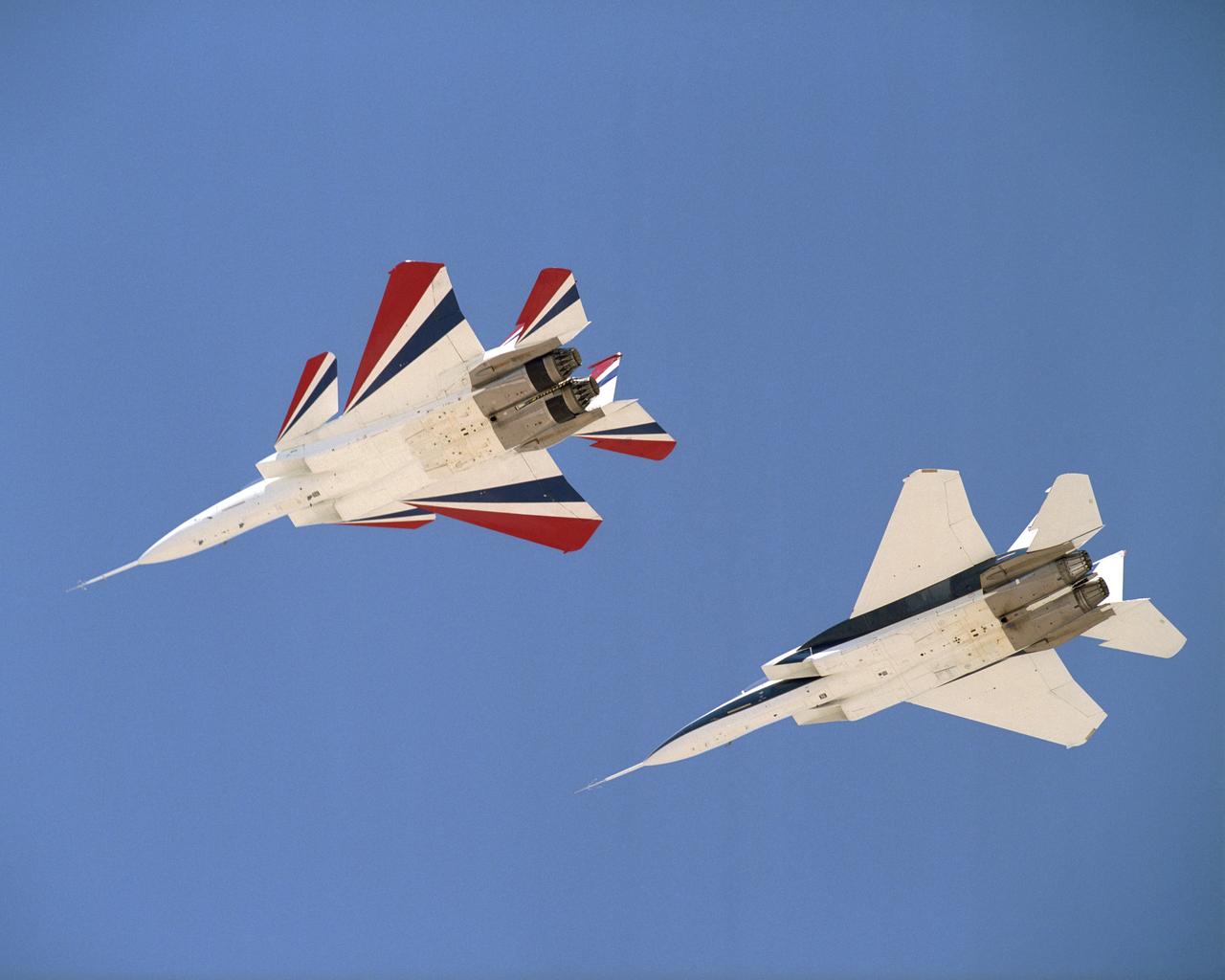 NASA's two modified F-15B research aircraft joined up for a fly-over of NASA's Dryden Flight Research Center on Edwards AFB, Calif., after a research mission.