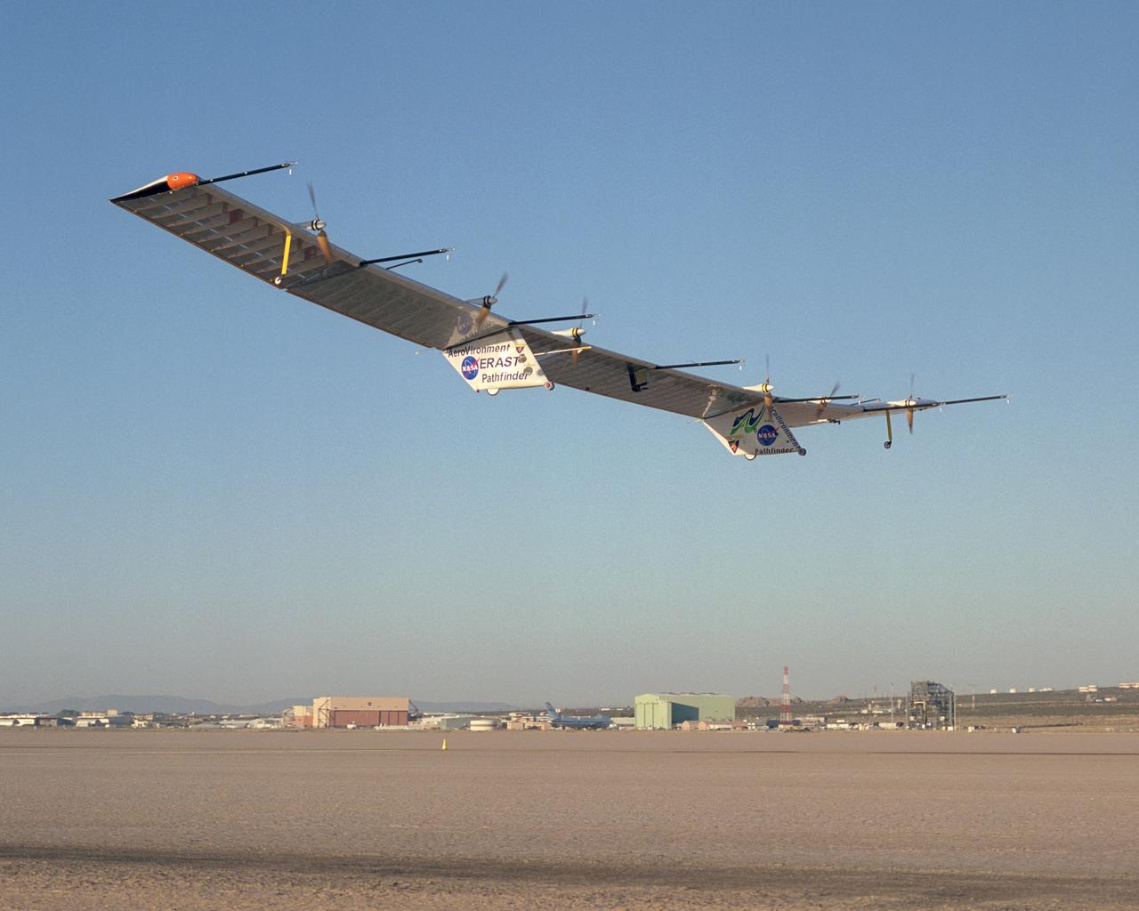 The Pathfinder-Plus solar-electric flying wing lifts off Rogers Dry Lake adjoining NASA Dryden Flight Research Center on a turbulence-measurement flight.