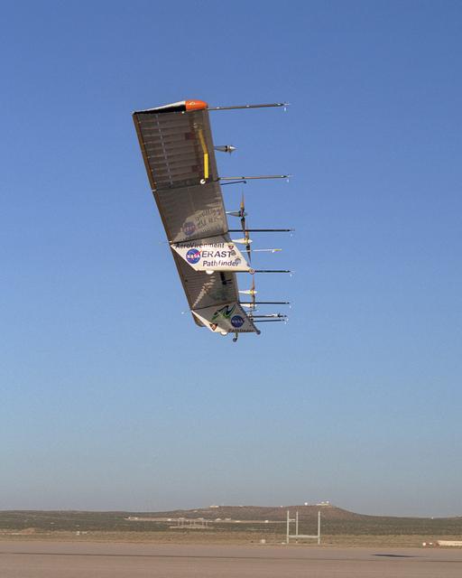 The Atmospheric Turbulence Measurement System booms are clearly evident in this view of the Pathfinder-Plus solar aircraft as it flies over Rogers Dry Lake.