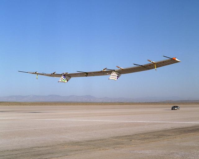 NASA image: The Pathfinder-Plus solar-electric flying wing lifts off Rogers Dry Lake adjoining NASA Dryden Flight Research Center on a turbulence-measurement flight.