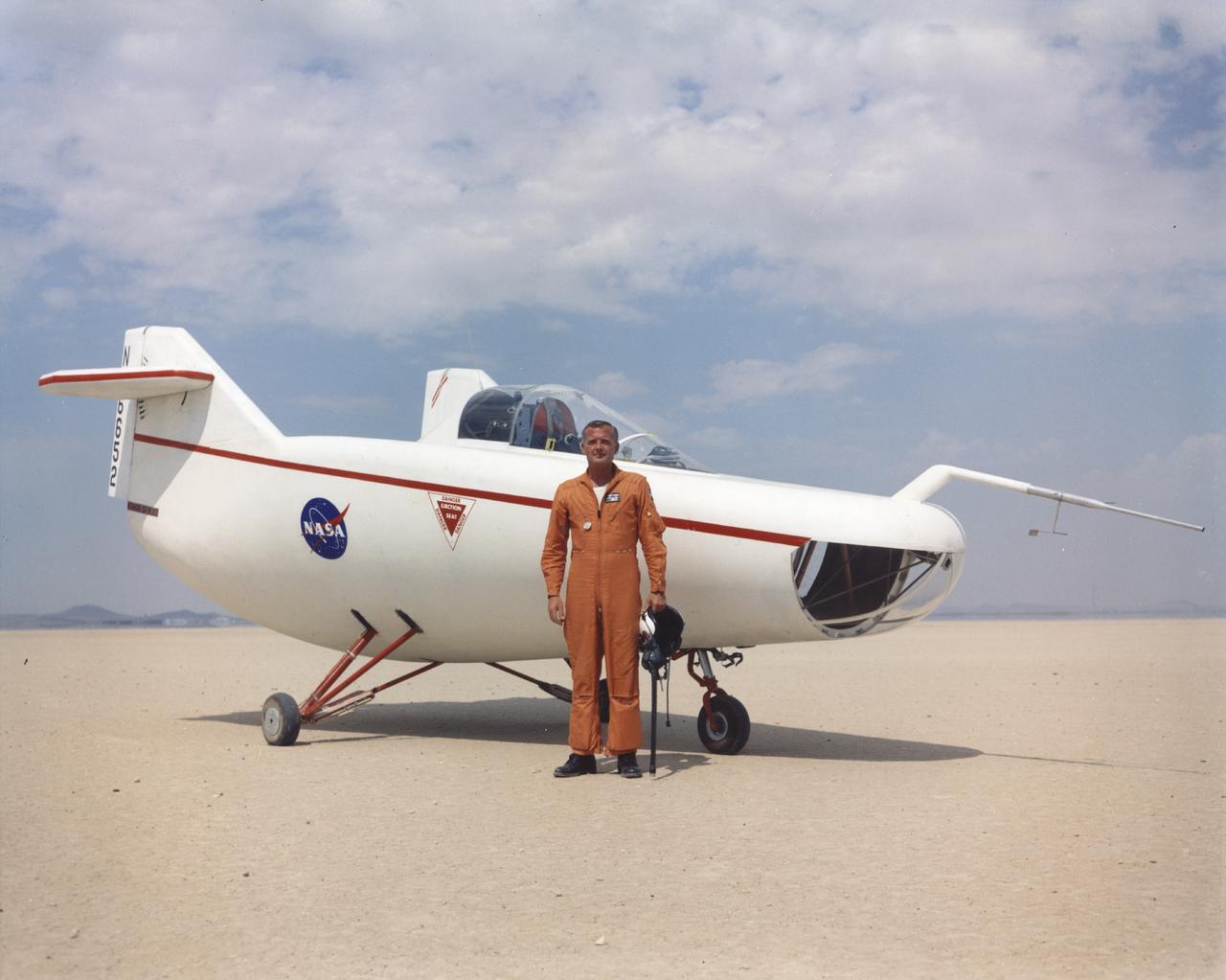 NASA Flight Research Pilot Milt Thompson, shown here on the lakebed with the M2-F1 lifting body, was an early backer of R. Dale Reed's lifting-body proposal. He urged Flight Research Center director Paul Bikle to approve the M2-F1's construction. Thompson also made the first glide flights in both the M2-F1 and its successor, the heavyweight M2-F2.