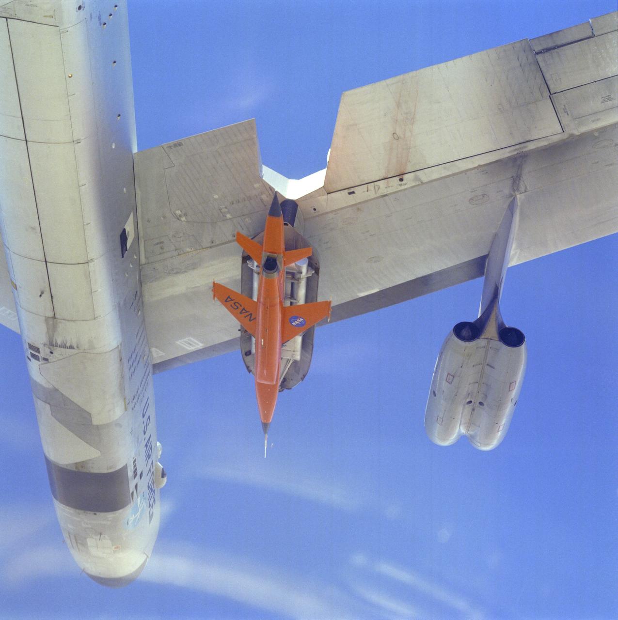 First Captive Flight of DAST Mated to B-52 - Close-up from Below
