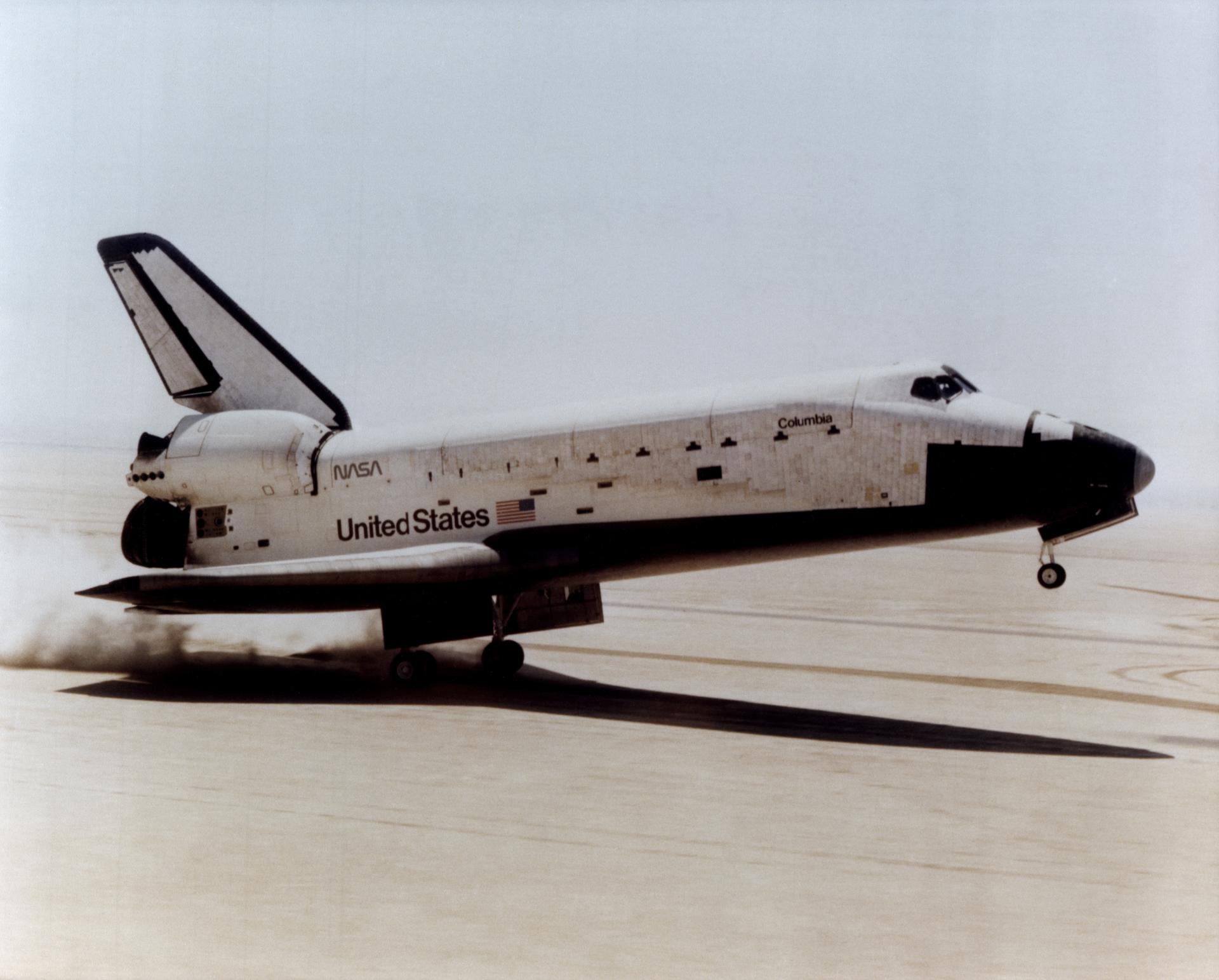 TOUCHDOWN! -- The Space Shuttle Columbia touches down on lakebed runway 23 at Edwards Air Force Base, Calif., to conclude the first orbital shuttle mission, April 14, 1981.