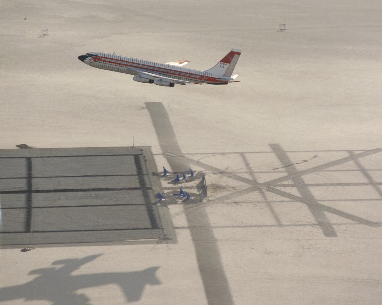 CID (Controlled Imact Demonstrator) Aircraft in practice flight above target impact site with wing cutters.