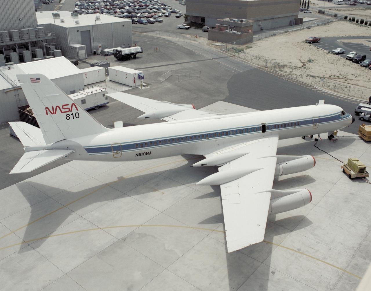 A NASA CV-990, modified as a Landing Systems Research Aircraft (LSRA), is serviced on the ramp at NASA's Dryden Flight Research Center, Edwards, California, before a test of the space shuttle landing gear system. The space shuttle landing gear test unit, operated by a high-pressure hydraulic system, allowed engineers to assess and document the performance of space shuttle main and nose landing gear systems, tires and wheel assemblies, plus braking and nose wheel steering performance. The series of 155 test missions for the space shuttle program provided extensive data about the life and endurance of the shuttle tire systems and helped raise the shuttle crosswind landing limits at Kennedy.