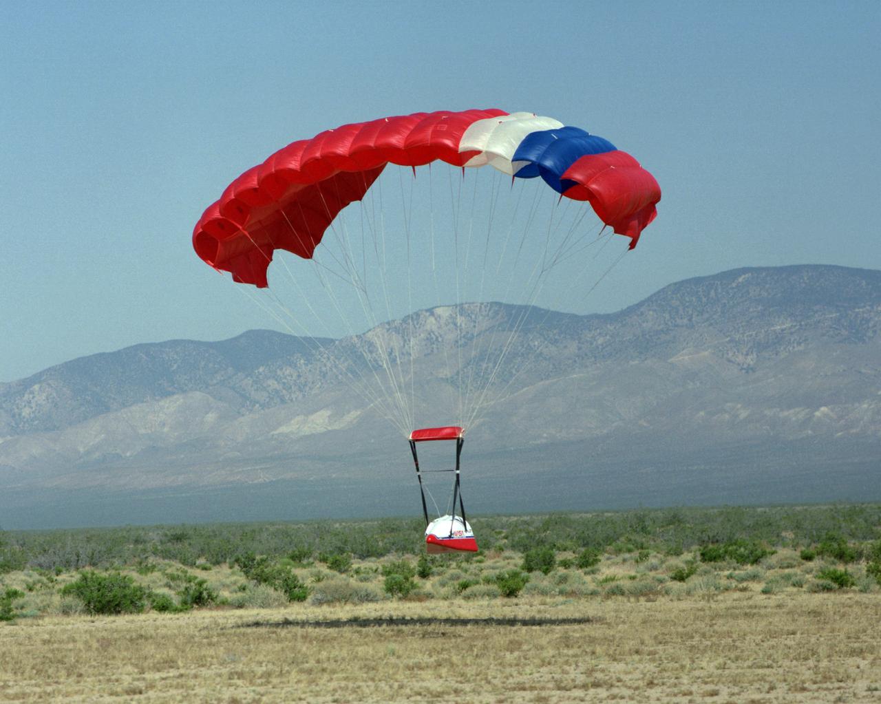 The Spacewedge subscale research model glides in toward a touchdown at a California City landing zone during 1992 flight tests of the vehicle.