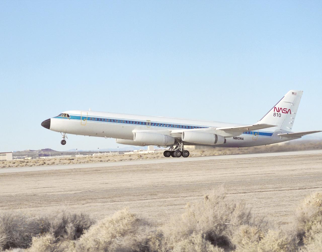 Taking off on a flight from NASA's Dryden Flight Research Center, Edwards, California, is NASA's Landing Systems Research Aircraft (LSRA), a modified Convair (CV) 990. A new landing gear test fixture representative of the shuttle's landing gear system had been installed in the lower fuselage of the CV-990 test aircraft between the aircraft's normal main landing gear. Following initial flights, static loads testing and calibration of the test gear were conducted at Dryden. Tests allowed engineers to assess the performance of the space shuttle's main and nose landing gear systems under varying conditions.