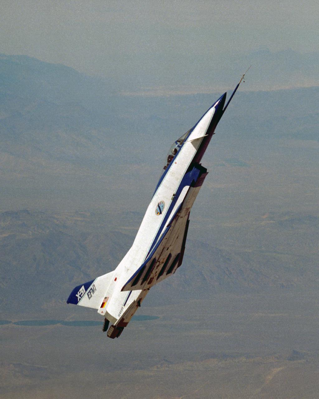 The X-31, the world’s first international X-plane, demonstrates controlled flight at high alpha courtesy of its canards and thrust vectoring paddles in the exhaust stream.