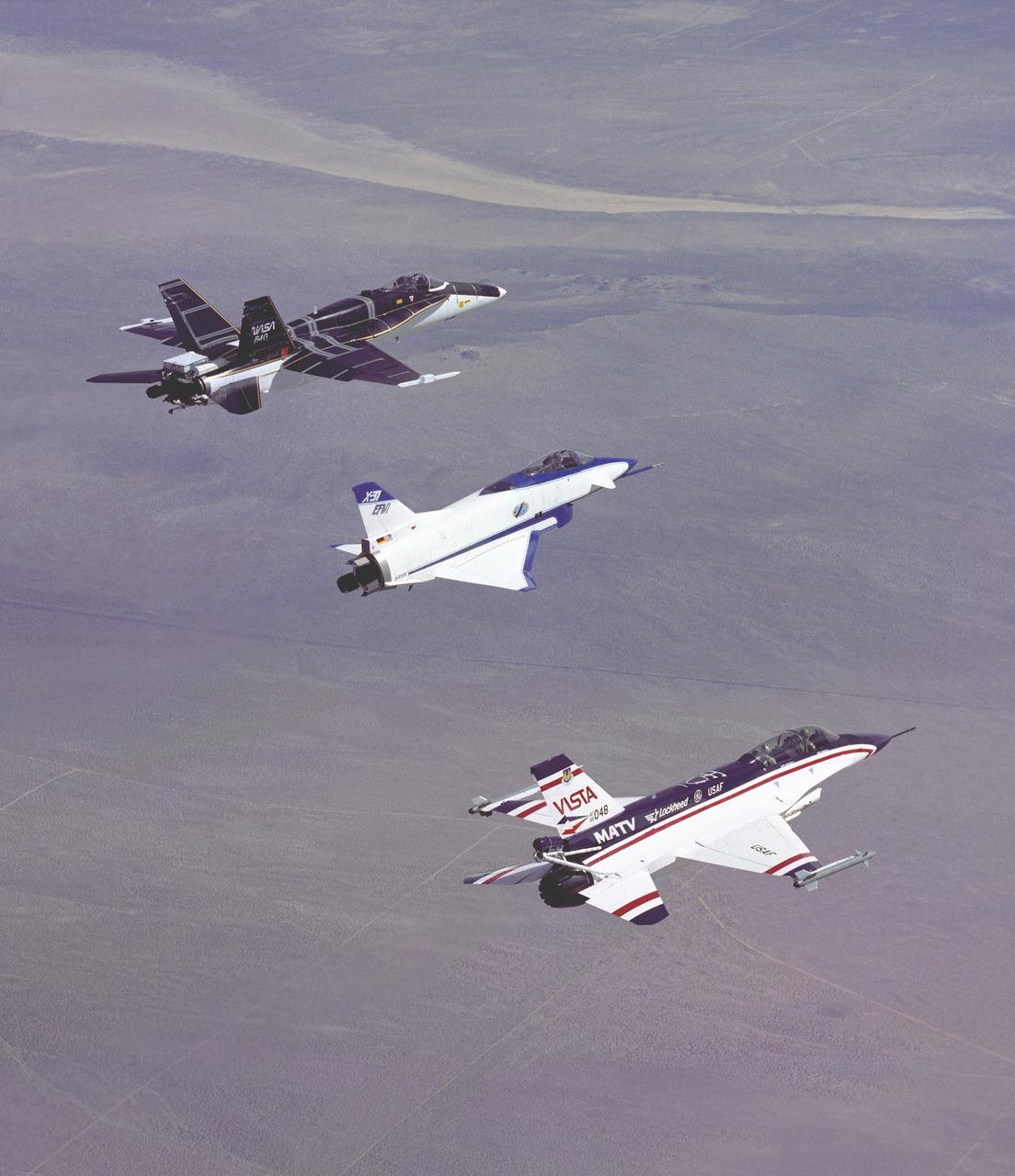 The three thrust-vectoring aircraft at Edwards, California, each capable of flying at extreme angles of attack, cruise over the California desert in formation during flight in March 1994. They are, from left, NASA's F-18 High Alpha Research Vehicle (HARV), flown by the NASA Dryden Flight Research Center; the X-31, flown by the X-31 International Test Organization (ITO) at Dryden; and the Air Force F-16 Multi-Axis Thrust Vectoring (MATV) aircraft.