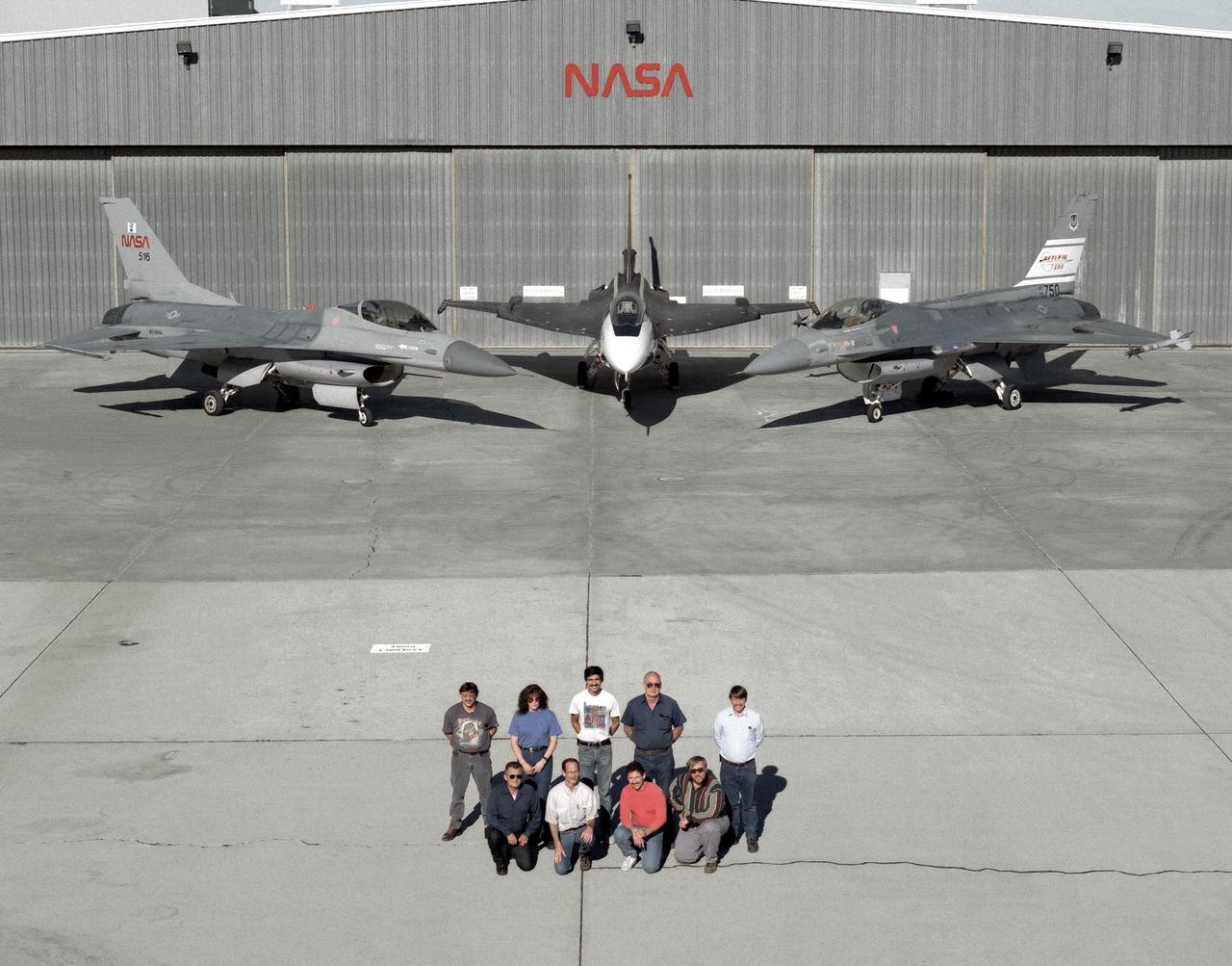 The support crew for the F-16A, the F-16XL no. 1, and the F-16 AFTI are, top row, left to right: Randy Weaver; mechanic, Susan Ligon; mechanic, Bob Garcia; Crew Chief, Rich Kelly; mechanic, Dale Edminister; Avionics Technician. Bottom row, left to right, Art Cope; mechanic, John Huffman; Avionics Technician, Jaime Garcia; Avionics Technician, Don Griffith, Avionics Tech. Co-op student. The F-16A (NASA 516), the only civil registered F-16 in existence, was transferred to Dryden from Langley, and was primarily used in engine tests and for parts. It was subsequently transfered from Dryden.  The single-seat F-16XL no. 1 (NASA 849) was most recently used in the Cranked-Arrow Wing Aerodynamics Project (CAWAP) to test boundary layer pressures and distribution. Previously it had been used in a program to investigate the characteristics of sonic booms for NASA's High Speed Research Program. Data from the program will be used in the development of a high speed civilian transport. During the series of sonic boom research flights, the F-16XL was used to probe the shock waves being generated by a NASA SR-71 and record their shape and intensity.  The Advanced Fighter Technology Integration (AFTI) F-16 was used to develop and demonstrate technologies to improve navigation and a pilot's ability to find and destroy enemy ground targets day or night, including adverse weather. Earlier research in the joint NASA-Air Force AFTI F-16 program demonstrated voice actuated controls, helmet-mounted sighting and integration of forward-mounted canards with the standard flight control system to achieve uncoupled flight.