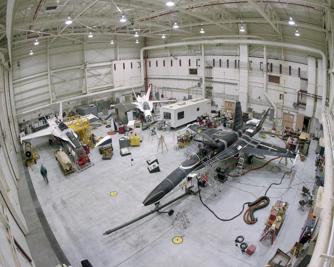 RAIF Hangar Bays 1 and 2. Three of NASA's F-18 aircraft can be seen in this photo. The SRA, or Systems Research Aircraft, is at the far left. In the middle is the F-18 Iron Bird, used for full-scale, hardware-in-the-loop simulations. On the right is the F-18 High Alpha Research Vehicle, or HARV.
