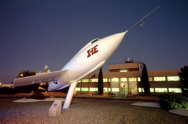NASA image: The X-1E guards NASA Dryden Flight Research Center's main building.