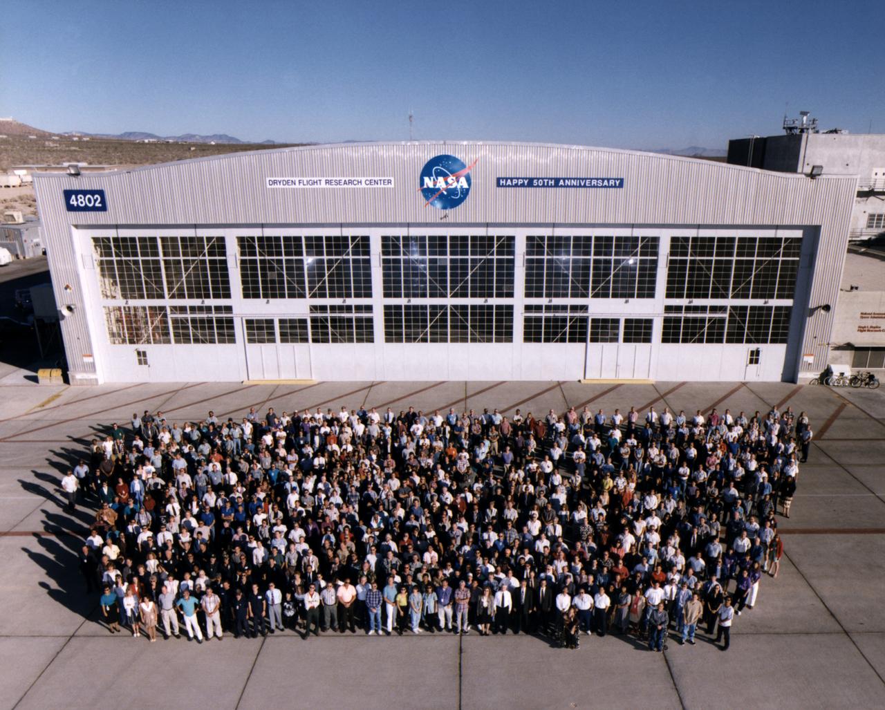 Complete NASA Dryden Staff of 1996 for 50th anniversary, on back ramp of building 4800