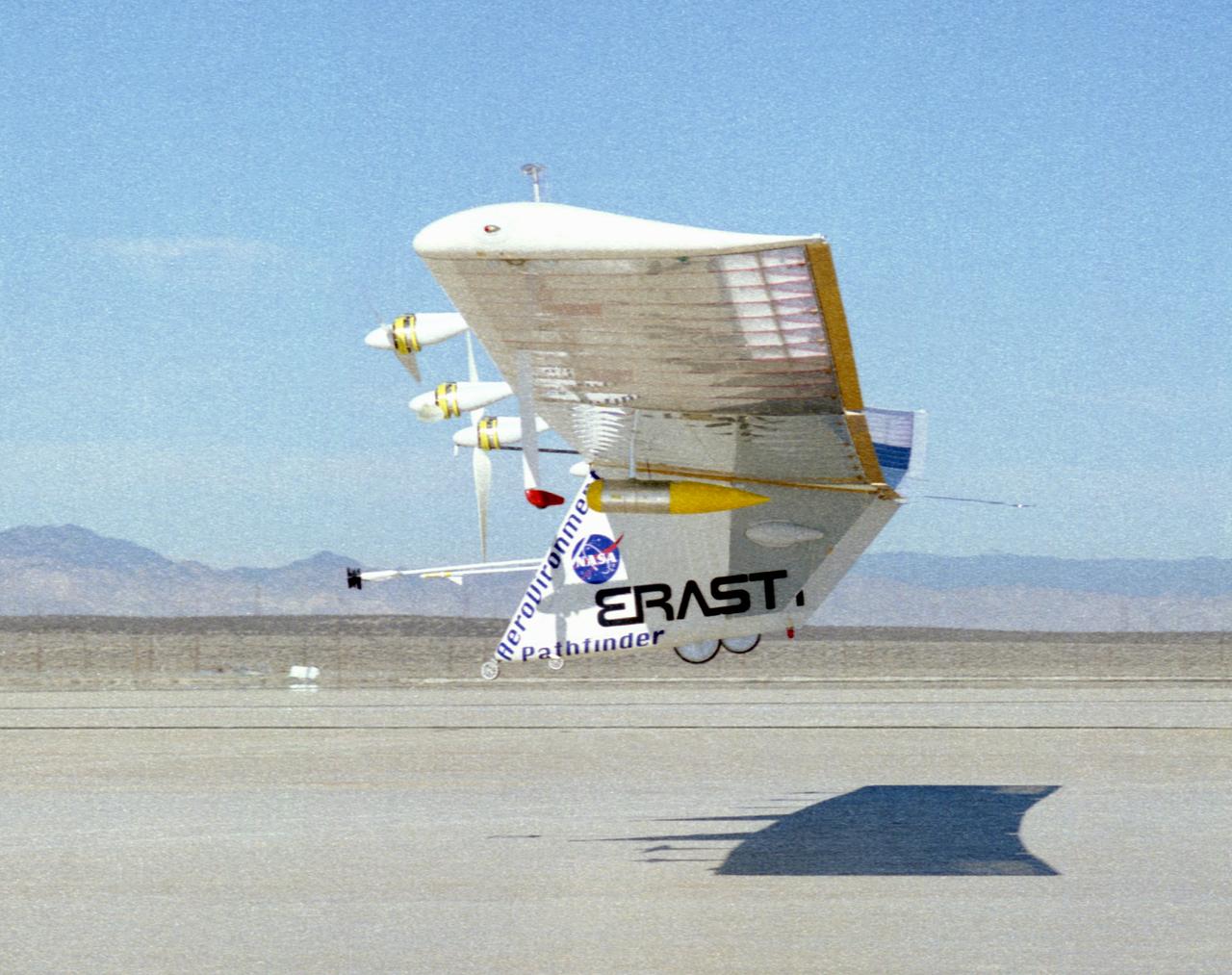 The Pathfinder solar-powered research aircraft heads for landing on the bed of Rogers Dry Lake at the Dryden Flight Research Center, Edwards, California, after a successful test flight Nov. 19, 1996.