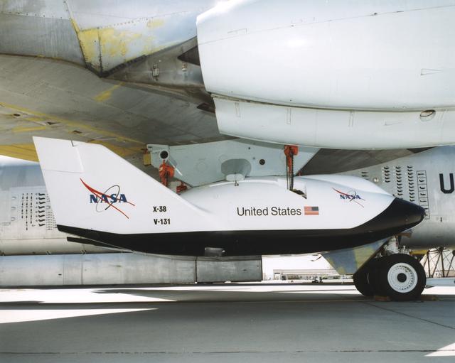 NASA image: X-38 Mounted on Pylon of B-52 Mothership