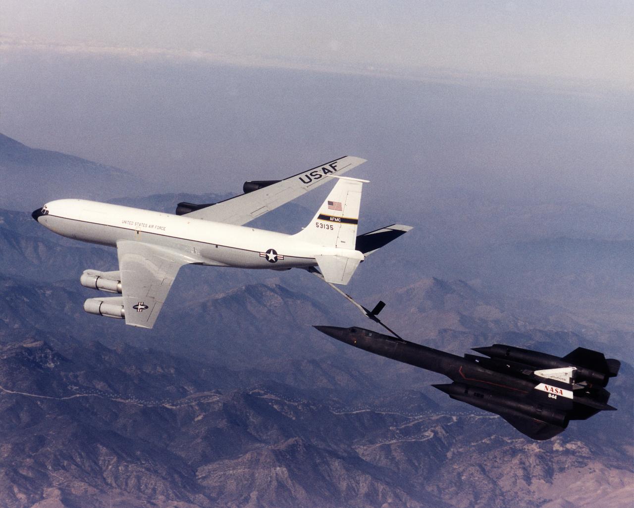 A NASA SR-71 refuels with an Edwards Air Force Base KC-135 during the first flight of the NASA/Rocketdyne/ Lockheed Martin Linear Aerospike SR-71 Experiment (LASRE). The flight took place Oct. 31 at NASA's Dryden Flight Research Center, Edwards, California. The SR-71 took off at 8:31 a.m. PST. The aircraft flew for one hour and fifty minutes, reaching a maximum speed of Mach 1.2 before landing at Edwards at 10:21 a.m. PST, successfully validating the SR-71/linear aerospike experiment configuration.  The goal of the first flight was to evaluate the aerodynamic characteristics and the handling of the SR-71/linear aerospike experiment configuration. The engine was not fired during the flight.