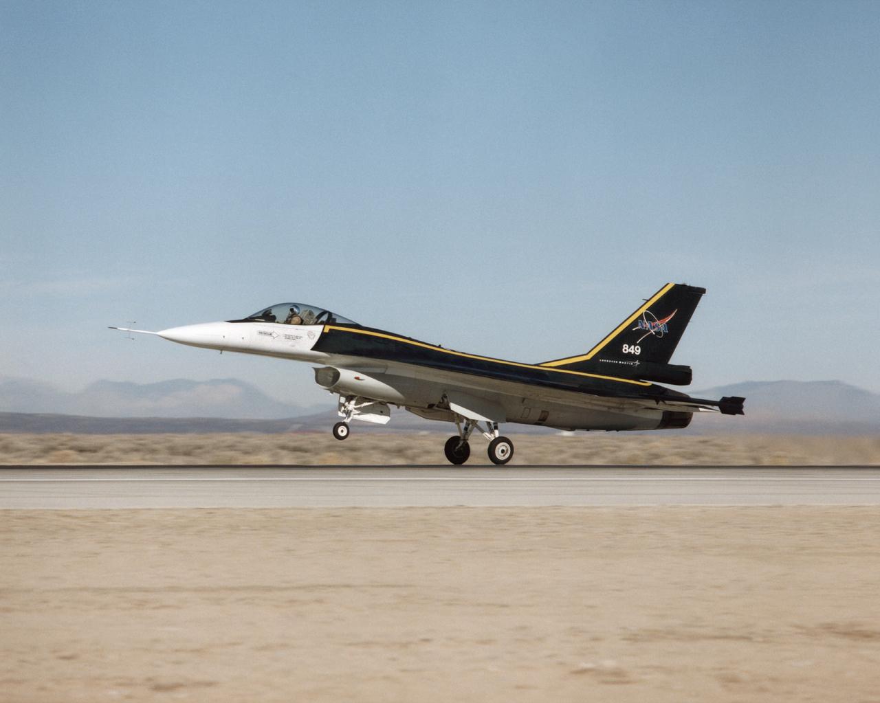 The F-16XL #1 (NASA 849) takes off for the first flight of the Digital Flight Control System (DFCS) on December 16, 1997. Like most first flight, the DFCS required months of preparations. During July 1997, crews worked on the engine, cockpit, canopy, seat, and instrumentation. By late August, the aircraft began combined systems tests and a flight readiness review. Although the Air Force Safety Review Board (AFSRB)- a group that provided double checks on all flight operations - approved the program in late November 1997, a problem with the aircraft flight computer delayed the functional check flight until mid-December. 