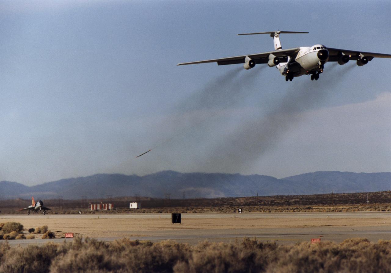 Eclipse project QF-106 and C-141A takeoff on first tethered flight December 20, 1997