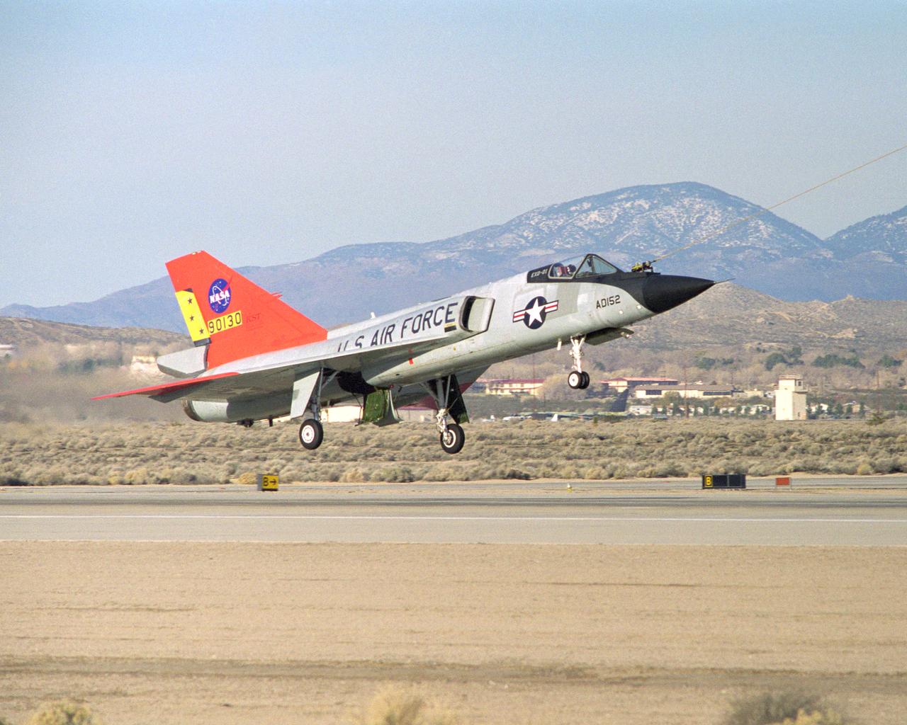 Eclipse project closeup of QF-106 under tow on takeoff on first flight December 20, 1997