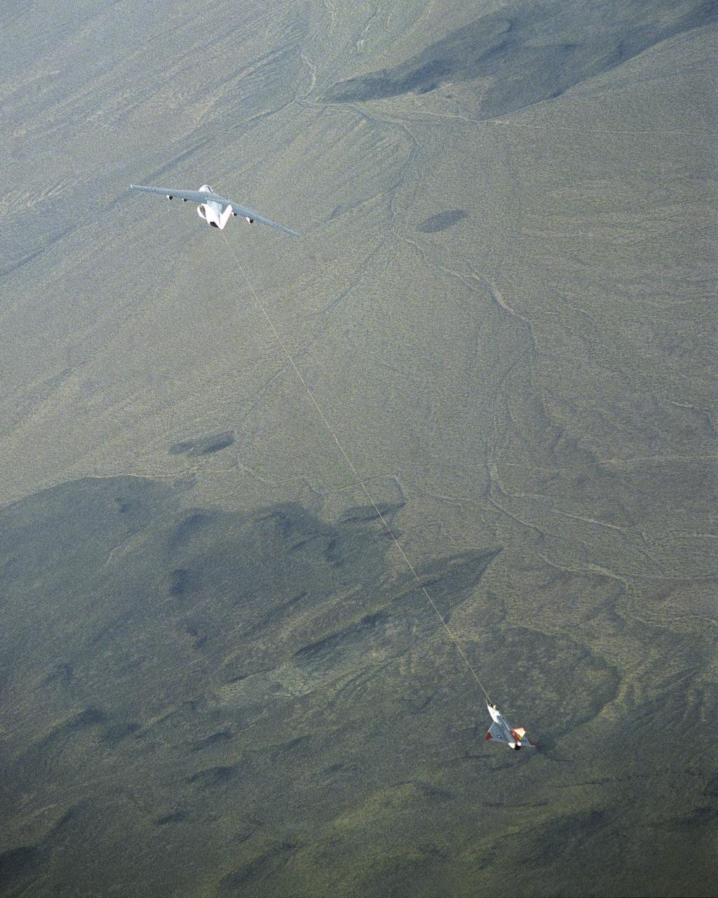 The Eclipse projectís modified QF-106 under tow by a USAF C-141A.