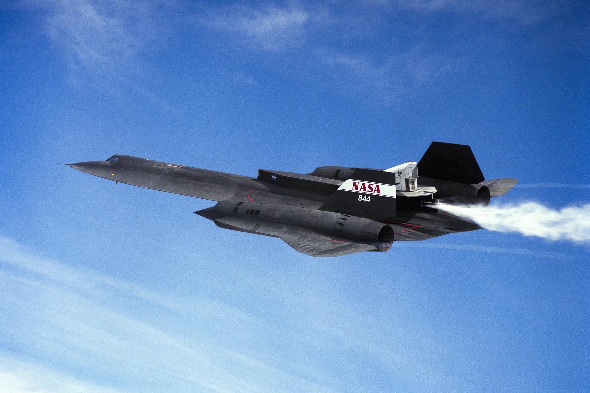 The NASA SR-71 triple-supersonic aircraft carries the Linear Aerospike Experiment on Wednesday, March 4, 1998, during a flight from NASA’s Armstrong (then Dryden) Flight Research Center in Edwards, California. Gaseous helium and liquid nitrogen cycled through the linear aerospike engine during the flight to check the engine’s plumbing system for leaks and to check the engine operating characteristics. Cold-flow tests must be accomplished successfully before firing the rocket engine experiment in flight.