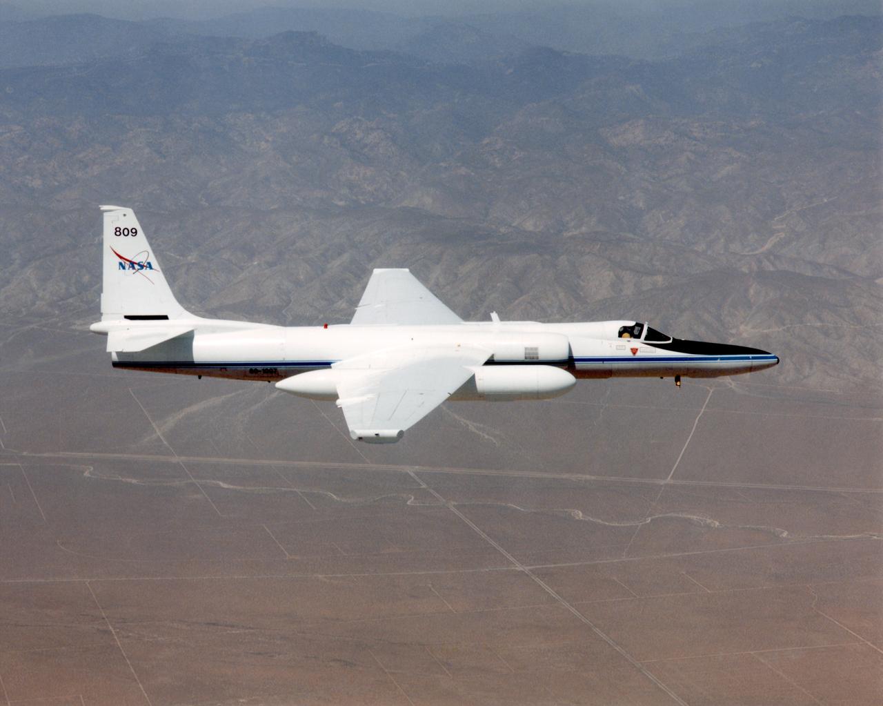 ER-2C tail number 809, was one of two Airborne Science ER-2Cs used as science platforms by Dryden. The aircraft were platforms for a variety of high-altitude science missions flown over various parts of the world. They were also used for earth science and atmospheric sensor research and development, satellite calibration and data validation.  The ER-2Cs were capable of carrying a maximum payload of 2,600 pounds of experiments in a nose bay, the main equipment bay behind the cockpit, two wing-mounted superpods and small underbody and trailing edges. Most ER-2C missions lasted about six hours with ranges of about 2,200 nautical miles. The aircraft typically flew at altitudes above 65,000 feet. On November 19, 1998, the ER-2C set a world record for medium weight aircraft reaching an altitude of 68,700 feet.  The aircraft was 63 feet long, with a wingspan of 104 feet. The top of the vertical tail was 16 feet above ground when the aircraft was on the bicycle-type landing gear. Cruising speeds were 410 knots, or 467 miles per hour, at altitude. A single General Electric F-118 turbofan engine rated at 17,000 pounds thrust powers the ER-2C.