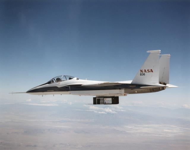 NASA image: F-15B in flight with X-33 Thermal Protection Systems (TPS) on Flight Test Fixture