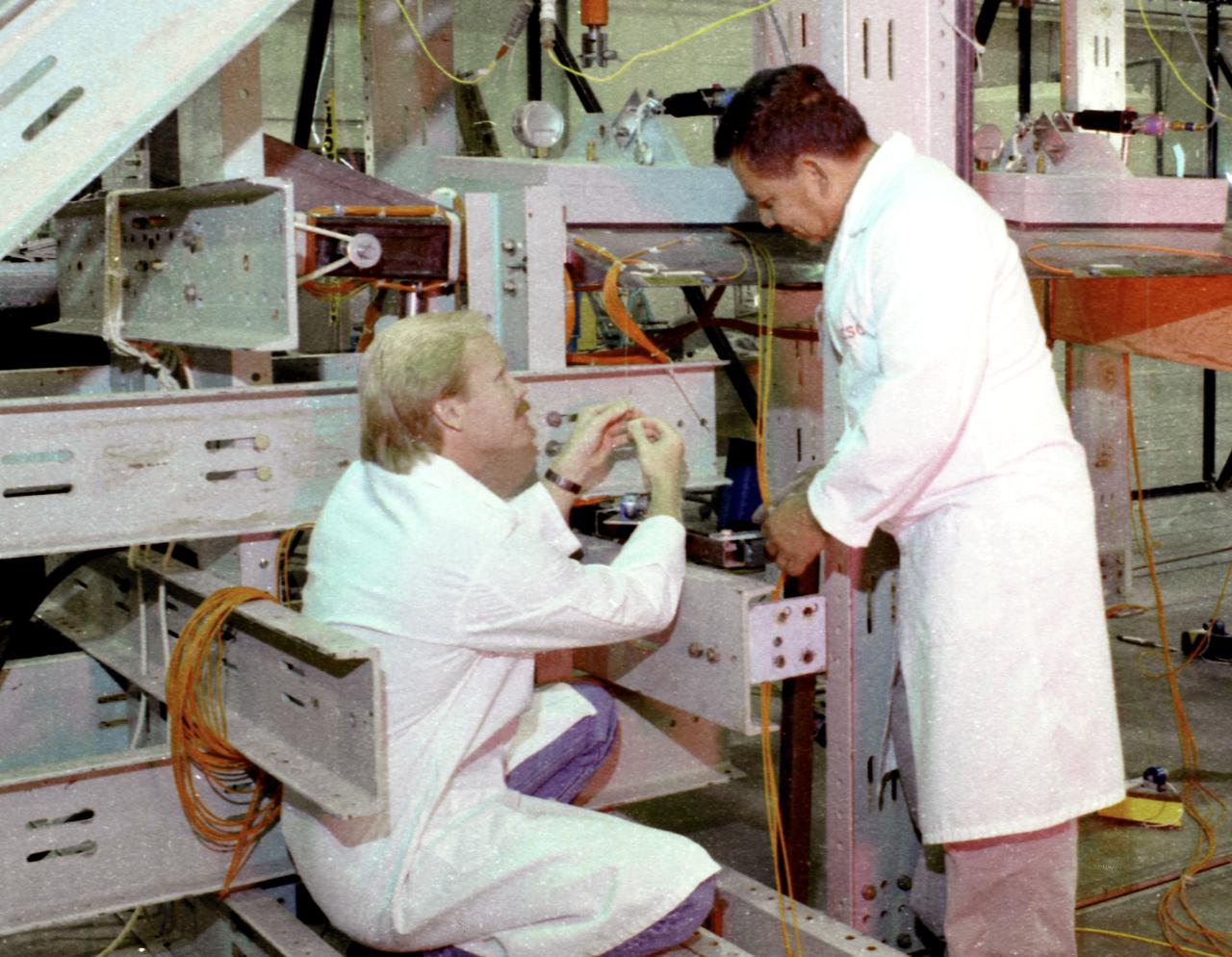 Apex wing section undergoing loading test preparation by Mark Nunnelee and Eliseo Sanchez