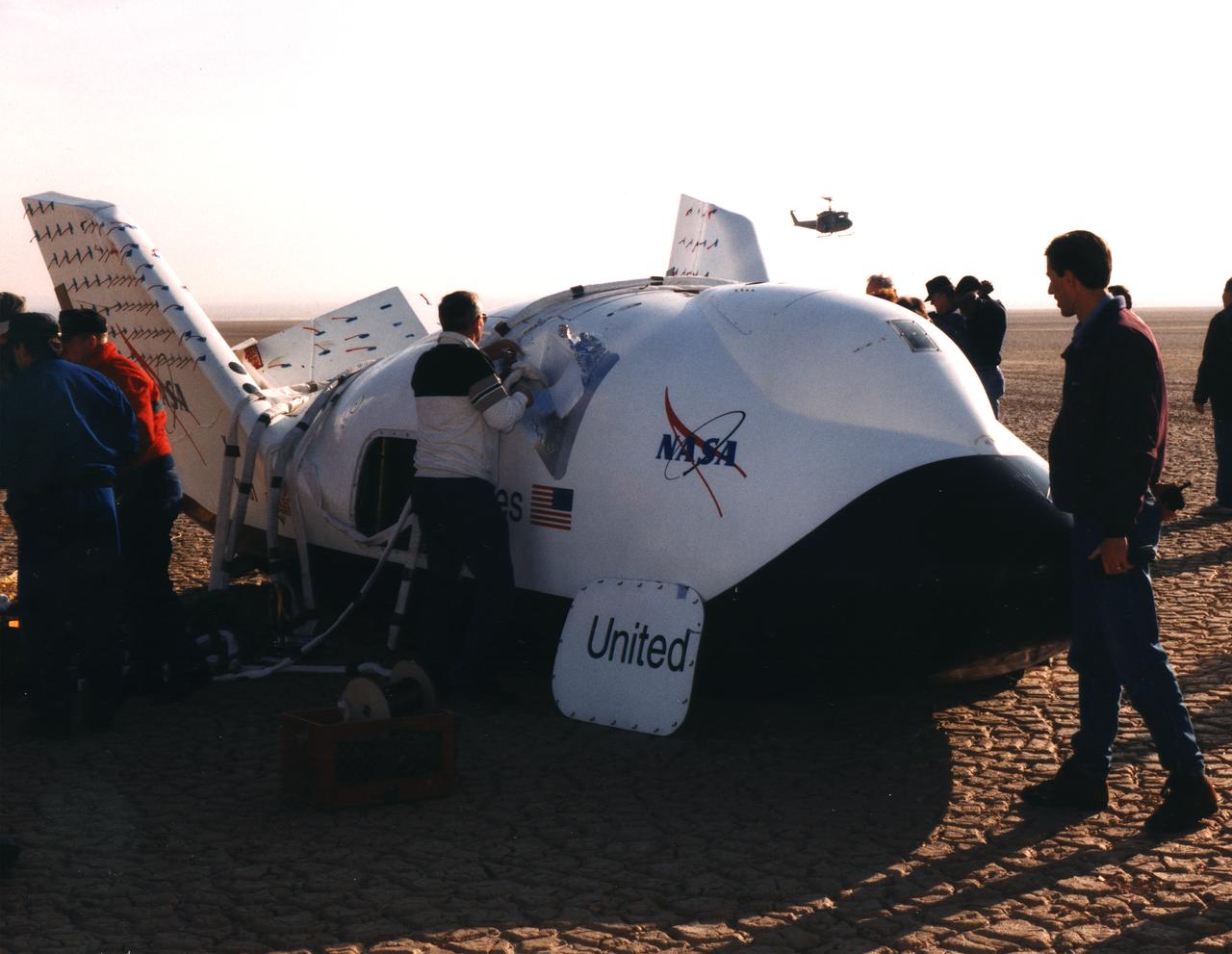 NASA's X-38, a prototype of a Crew Return Vehicle (CRV) resting on the lakebed near the Dryden Flight Research Center after the completion of its second free flight. The X-38 was launched from NASA Dryden's B-52 Mothership on Saturday, February 6, 1999, from an altitude of approximately 23,000 feet.