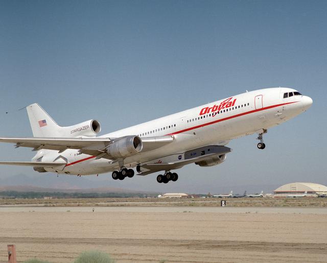 NASA image: X-34 mated to modified L-1011 during takeoff on first captive carry flight
