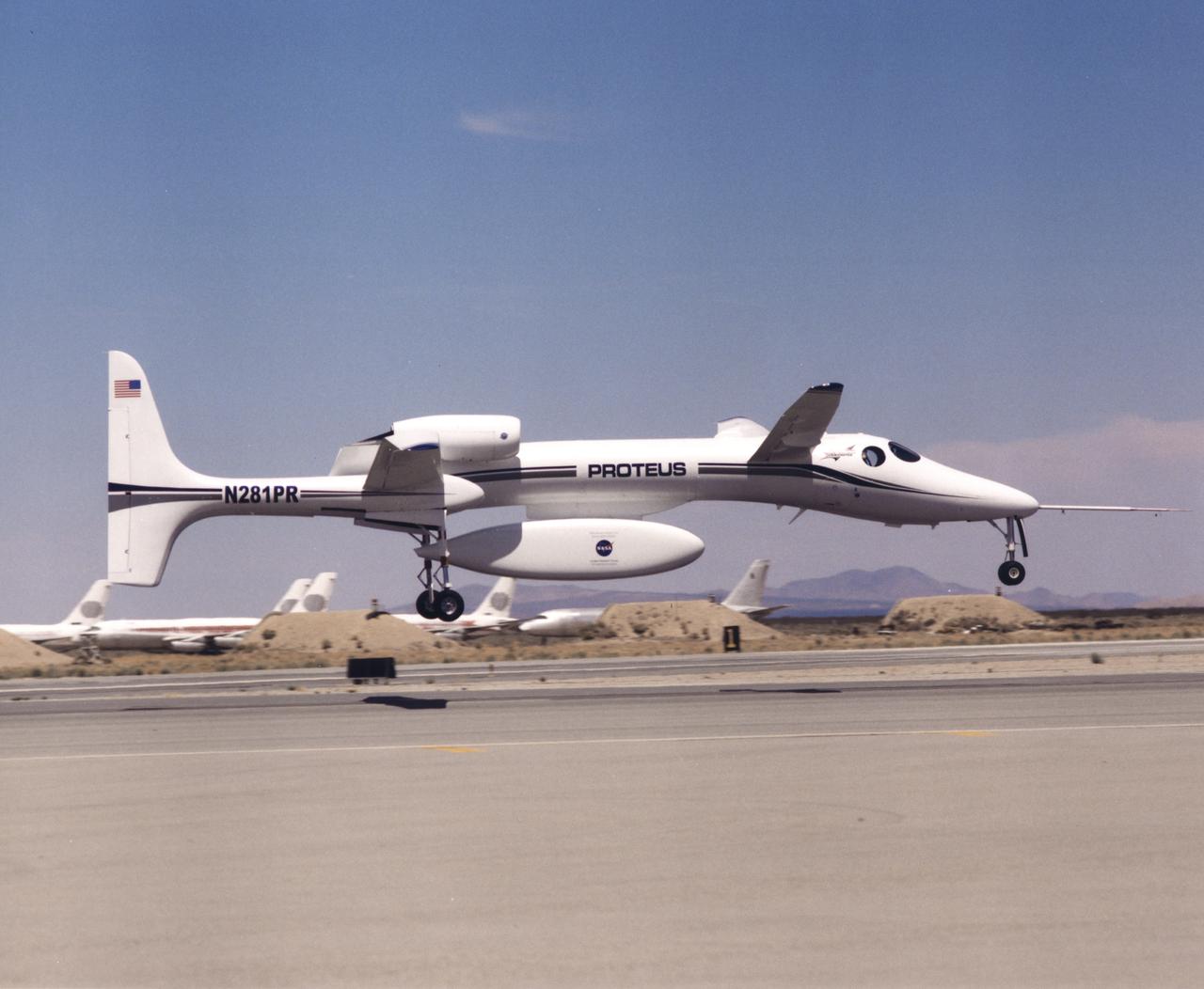 The uniquely-shaped Proteus high-altitude research aircraft lifts off from the runway at the Mojave Airport in Mojave, California.