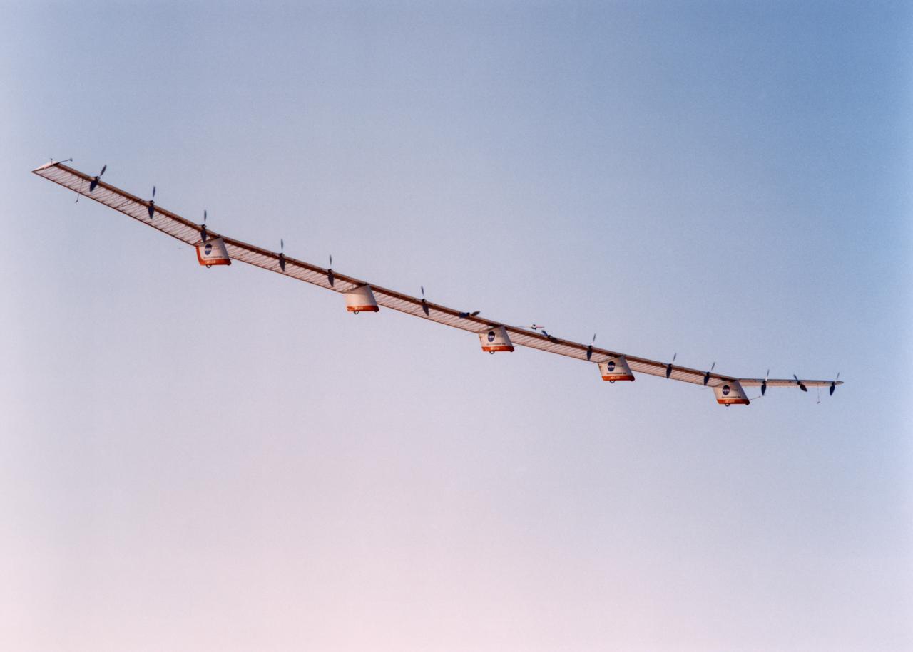 The Helios Prototype is an enlarged version of the Centurion flying wing, which flew a series of test flights at Dryden in late 1998. The craft has a wingspan of 247 feet, 41 feet greater than the Centurion, 2 1/2 times that of its solar-powered Pathfinder flying wing, and longer than either the Boeing 747 jetliner or Lockheed C-5 transport aircraft.