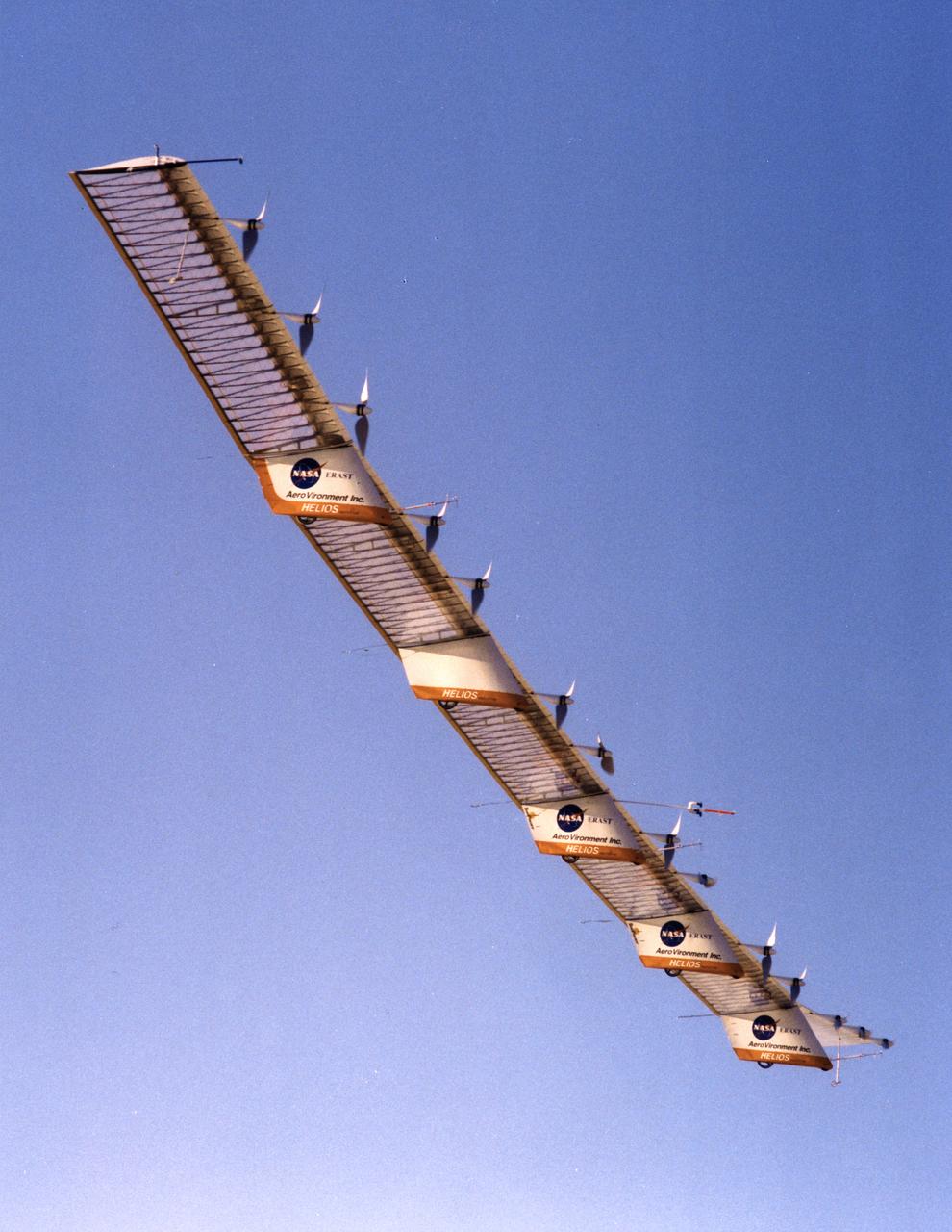 The Helios Prototype is an enlarged version of the Centurion flying wing, which flew a series of test flights at Dryden in late 1998. The craft has a wingspan of 247 feet, 41 feet greater than the Centurion, 2 1/2 times that of its solar-powered Pathfinder flying wing, and longer than either the Boeing 747 jetliner or Lockheed C-5 transport aircraft.