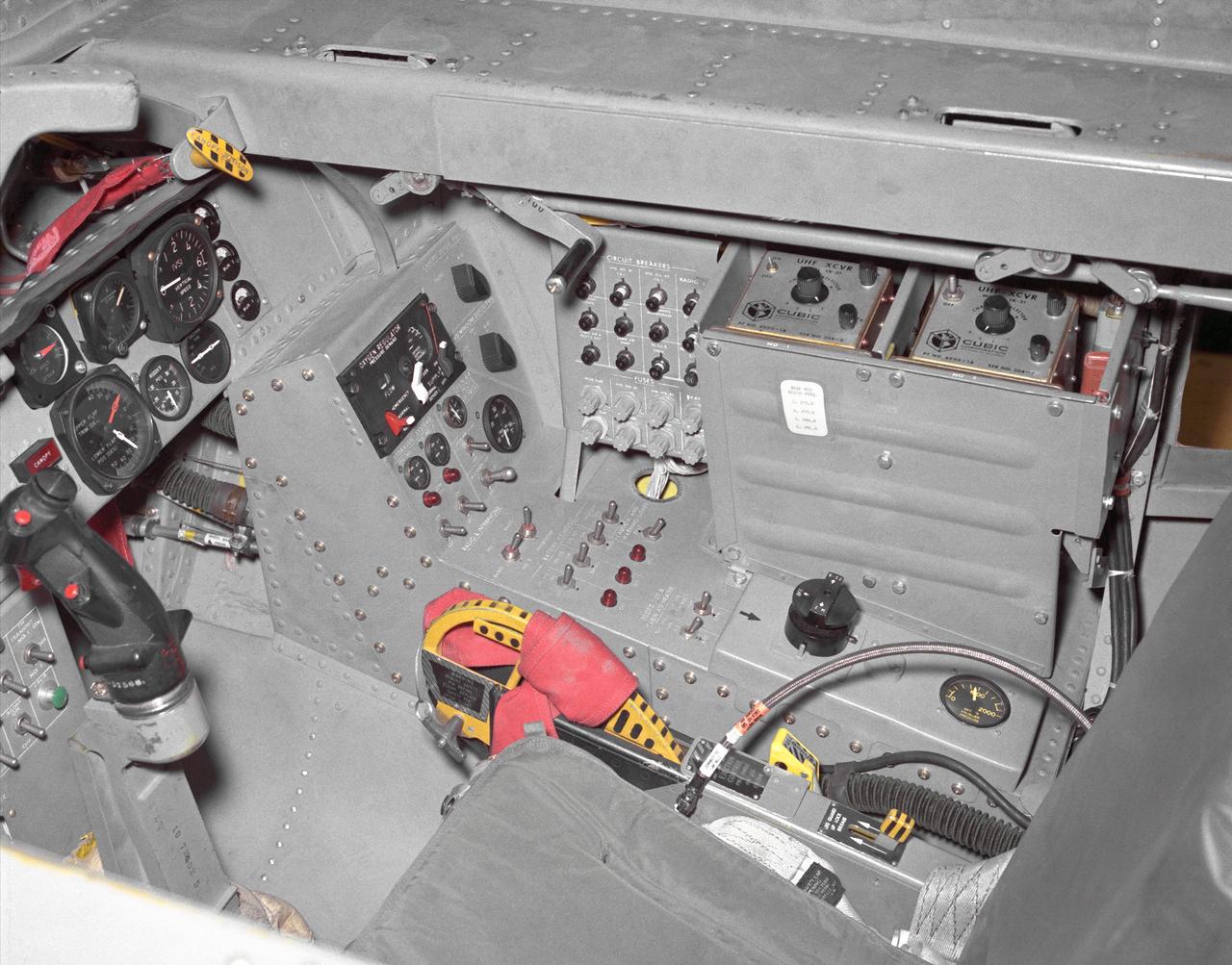 This photo shows the right side cockpit instrumentation panel of the M2-F2 Lifting Body. The success of Dryden's M2-F1 program led to NASA's development and construction of two heavyweight lifting bodies based on studies at NASA's Ames and Langley research centers -- the M2-F2 and the HL-10, both built by the Northrop Corporation. The "M" refers to "manned" and "F" refers to "flight" version. "HL" comes from "horizontal landing" and 10 is for the tenth lifting body model to be investigated by Langley.  The first flight of the M2-F2 -- which looked much like the "F1" -- was on July 12, 1966. Milt Thompson was the pilot. By then, the same B-52 used to air launch the famed X-15 rocket research aircraft was modified to also carry the lifting bodies. Thompson was dropped from the B-52's wing pylon mount at an altitude of 45,000 feet on that maiden glide flight.  The M2-F2 weighed 4,620 pounds, was 22 feet long, and had a width of about 10 feet.  On May 10, 1967, during the sixteenth glide flight leading up to powered flight, a landing accident severely damaged the vehicle and seriously injured the NASA pilot, Bruce Peterson.  NASA pilots and researchers realized the M2-F2 had lateral control problems, even though it had a stability augmentation control system. When the M2-F2 was rebuilt at Dryden and redesignated the M2-F3, it was modified with an additional third vertical fin -- centered between the tip fins -- to improve control characteristics.  The M2-F2/F3 was the first of the heavy-weight, entry-configuration lifting bodies. Its successful development as a research test vehicle answered many of the generic questions about these vehicles.  NASA donated the M2-F3 vehicle to the Smithsonian Institute in December 1973. It is currently hanging in the Air and Space Museum along with the X-15 aircraft number 1, which was its hangar partner at Dryden from 1965 to 1969.