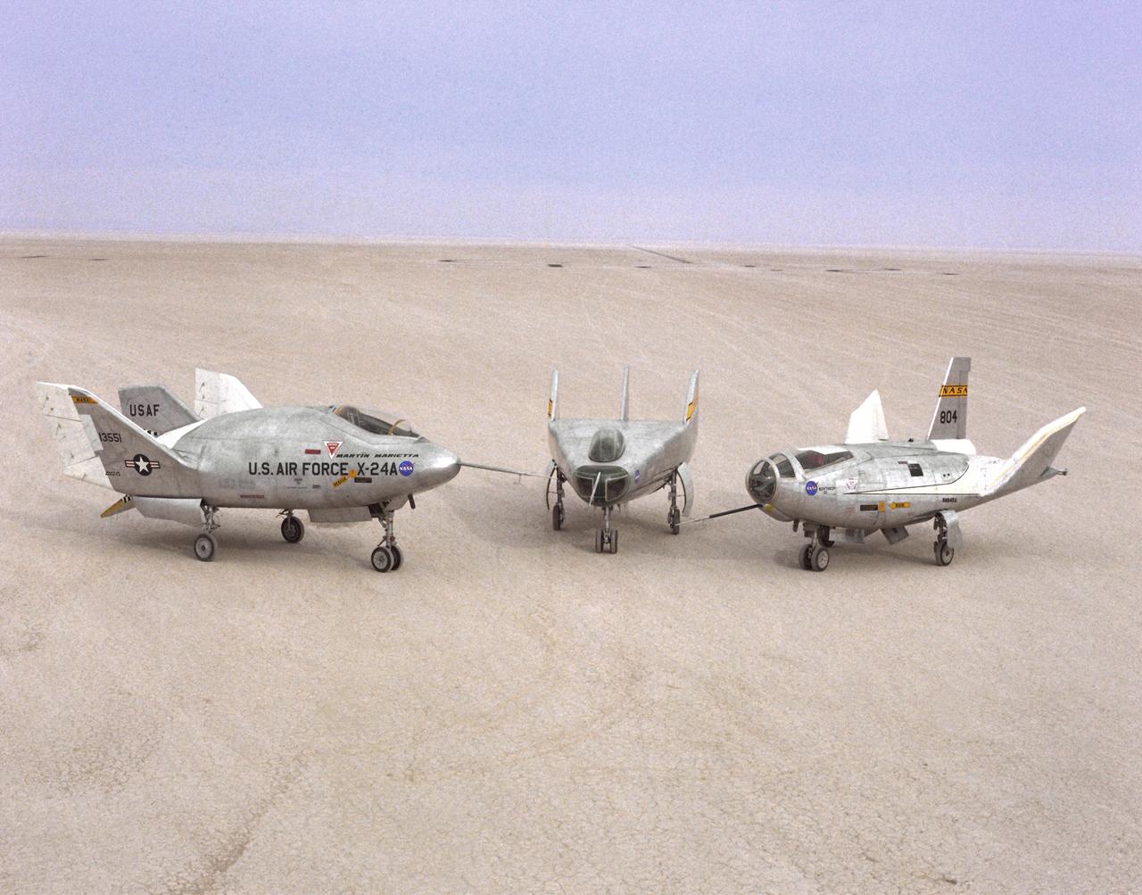 The wingless, lifting body aircraft sitting on Rogers Dry Lake at what is now NASA's Dryden Flight Research Center, Edwards, California, from left to right are the X-24A, M2-F3 and the HL-10. The lifting body aircraft studied the feasibility of maneuvering and landing an aerodynamic craft designed for reentry from space. These lifting bodies were air launched by a B-52 mother ship, then flew powered by their own rocket engines before making an unpowered approach and landing. They helped validate the concept that a space shuttle could make accurate landings without power.  The X-24A flew from April 17, 1969 to June 4, 1971. The M2-F3 flew from June 2, 1970 until December 22, 1972. The HL-10 flew from December 22, 1966 until July 17, 1970, and logged the highest and fastest records in the lifting body program.