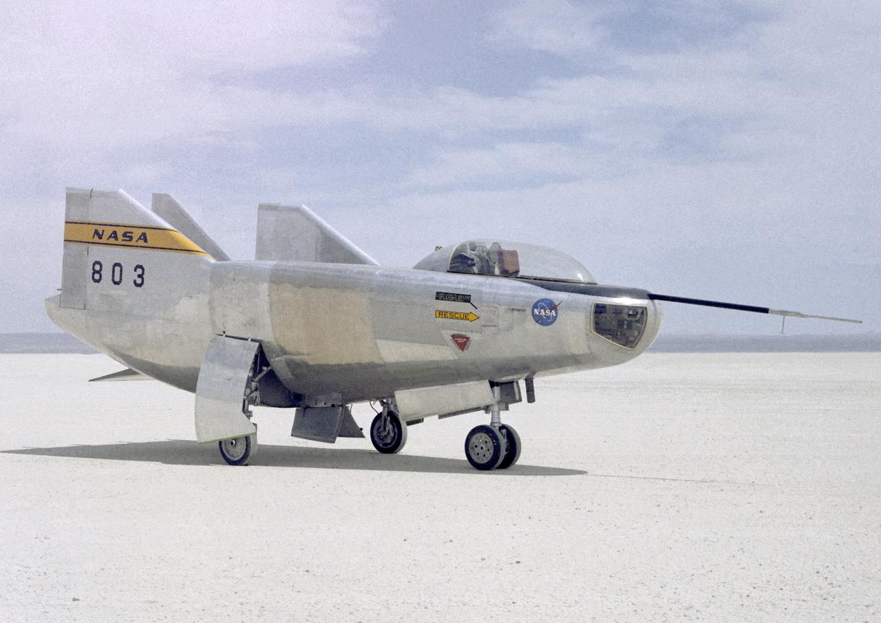 The M2-F3 Lifting Body is seen here on the lakebed next to the NASA Flight Research Center (FRC--later Dryden Flight Research Center), Edwards, California. The May 1967 crash of the M2-F2 had torn off the left fin and landing gear. It had also damaged the external skin and internal structure. Flight Research Center engineers worked with Ames Research Center and the Air Force in redesigning the vehicle with a center fin to provide greater stability. Then Northrop Corporation cooperated with the FRC in rebuilding the vehicle. The entire process took three years.