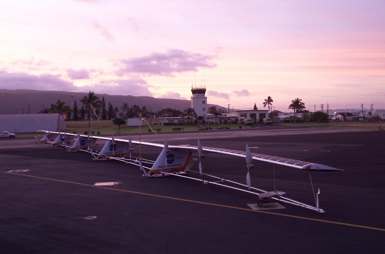 The 247-foot length of the Helios prototype wing is in evidence as the high-altitude, solar-powered flying wing rests on its ground dolly during pre-flight tests at the U.S. Navy's Pacific Missile Range Facility on Kaua'i, Hawaii.