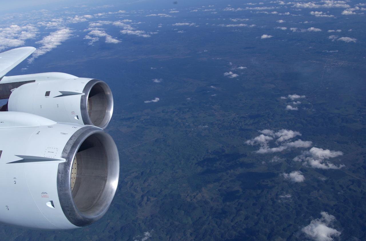 This is a photograph from the left side of the aircraft as NASA's DC-8 does an AirSAR 2004 research "line" over Honduras. AirSAR 2004 is a three-week expedition by an international team of scientists that will use an all-weather imaging tool, called the Airborne Synthetic Aperture Radar (AirSAR), in a mission ranging from the tropical rain forests of Central America to frigid Antarctica.