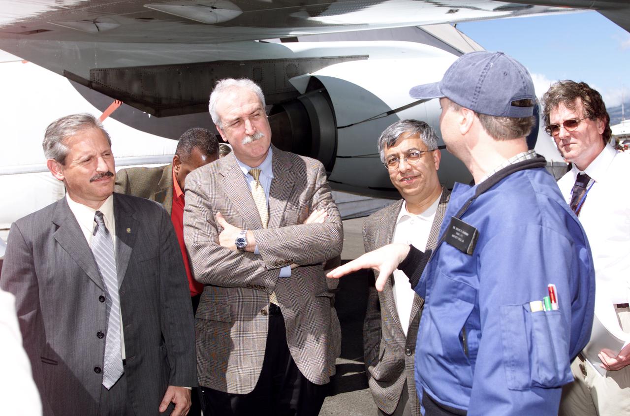 Personnel viewing AirSAR hardware while touring the outside of NASA's DC-8 during a stop-off on the AirSAR 2004 Mesoamerica campaign, L-R: Fernando Gutierrez, Costa Rican Minister of Science and Technology(MICIT); NASA Administrator Sean O'Keefe; Dr. Gahssem Asrar, NASA Associate Administrator for Earth Science Enterprises; JPL scientist Bruce Chapman; and Craig Dobson, NASA Program Manager for AirSAR. AirSAR 2004 Mesoamerica is a three-week expedition by an international team of scientists that will use an all-weather imaging tool, called the Airborne Synthetic Aperture Radar (AirSAR), in a mission ranging from the tropical rain forests of Central America to frigid Antarctica.
