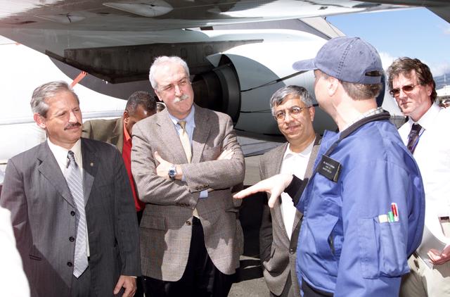 NASA image: Personnel viewing AirSAR hardware while touring the outside of NASA's DC-8 during a stop-off on the AirSAR 2004 Mesoamerica campaign