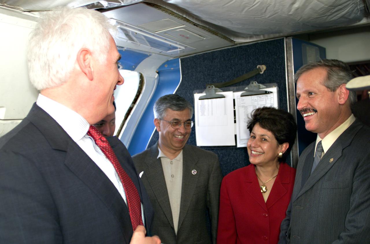 VIP’s onboard NASA's DC-8 aircraft during the AirSAR 2004 Mesoamerica campaign, L-R: Mr. John Danilovich, US Ambassador to Costa Rica; Dr. Gahssem Asrar, NASA Associate Administrator for Earth Science Enterprises; Dr. Sonia Marta Mora, President of the Costa Rican National Rector’s Council; and Fernando Gutierrez, Costa Rican Minister of Science and Technology(MICIT). AirSAR 2004 Mesoamerica is a three-week expedition by an international team of scientists that will use an all-weather imaging tool, called the Airborne Synthetic Aperture Radar (AirSAR), in a mission ranging from the tropical rain forests of Central America to frigid Antarctica.