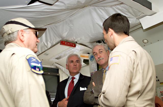 NASA image: Tom Mace and Walter Klein(far right) brief John Danilovich, US Ambassador to Costa Rica, and NASA Administrator Sean O'Keefe onboard NASA's DC-8