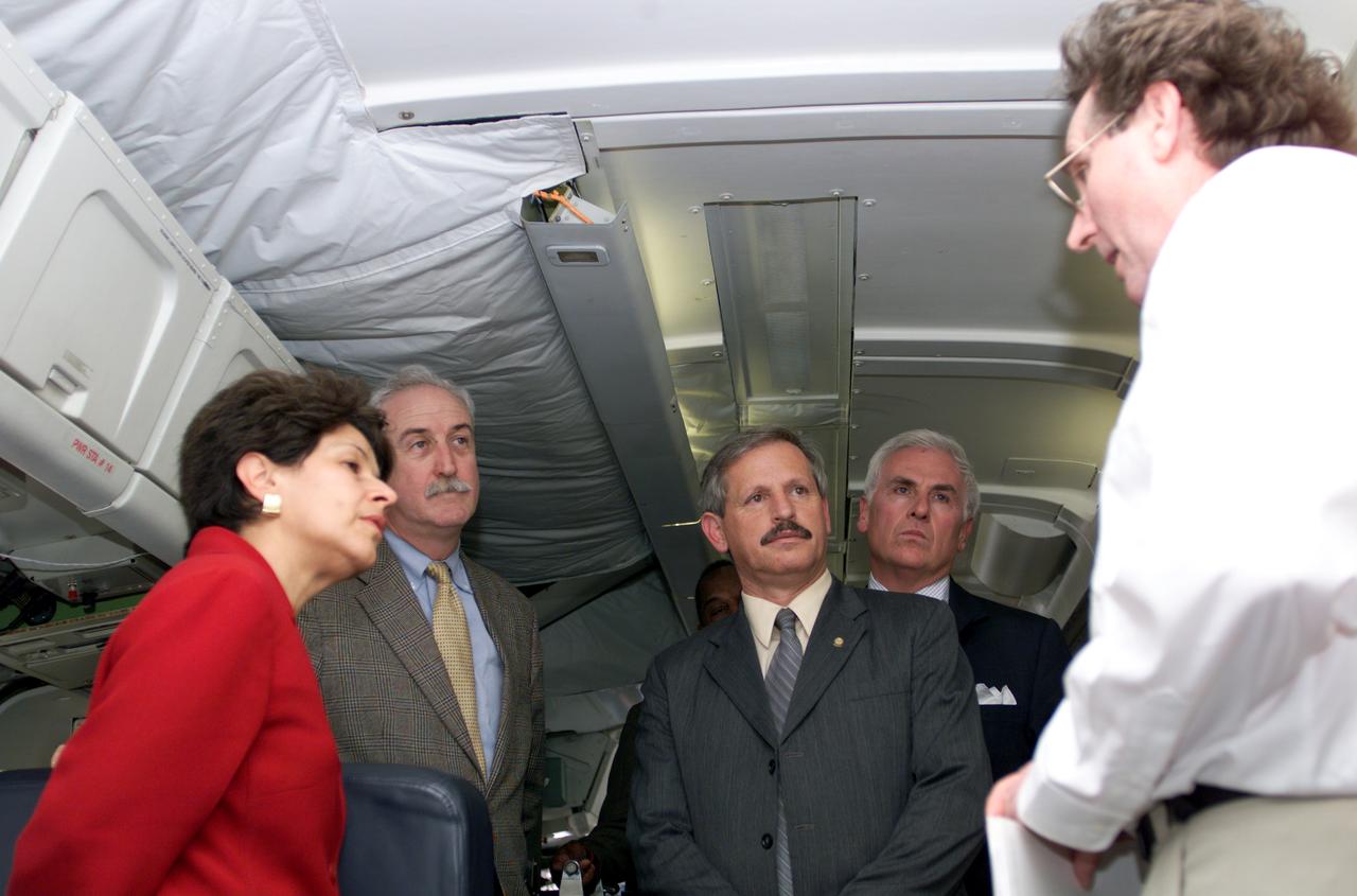 VIP tour of NASA DFRC's DC-8 airborne laboratory during the AirSAR 2004 Mesoamerica campaign given by Craig Dobson, NASA Program Manager for AirSAR, L-R: Dr. Sonia Marta Mora, President of the Costa Rican National Rector’s Council; NASA Administrator Sean O'Keefe; Fernando Gutierrez, Costa Rican Minister of Science and Technology(MICIT); Mr. John Danilovich, US Ambassador to Costa Rica; and Dobson. AirSAR 2004 Mesoamerica is a three-week expedition by an international team of scientists that will use an all-weather imaging tool, called the Airborne Synthetic Aperture Radar (AirSAR), in a mission ranging from the tropical rain forests of Central America to frigid Antarctica.